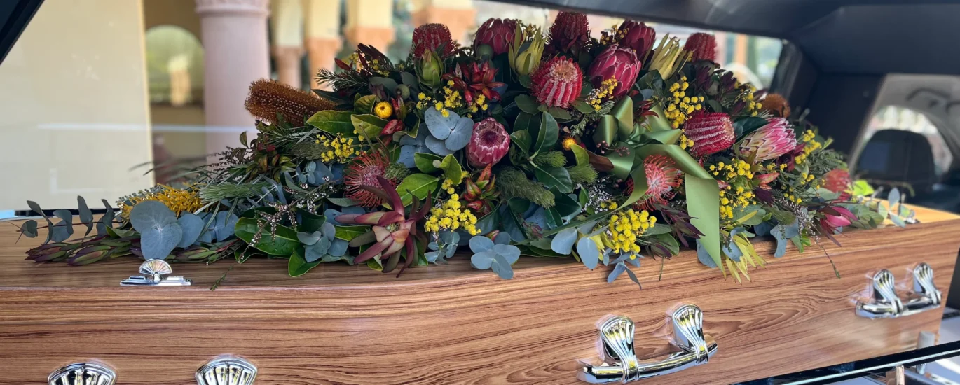 Casket Flowers Sydney: The One Tribute That Sits on the Coffin